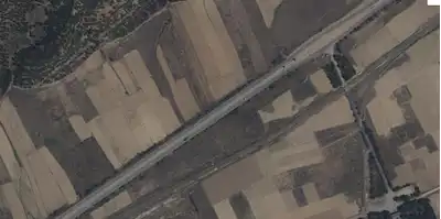 AFYON DAZKIRI AŞAĞIYENICE’DE YOLA CEPHELI 1.168 M² SATILIK TARLA