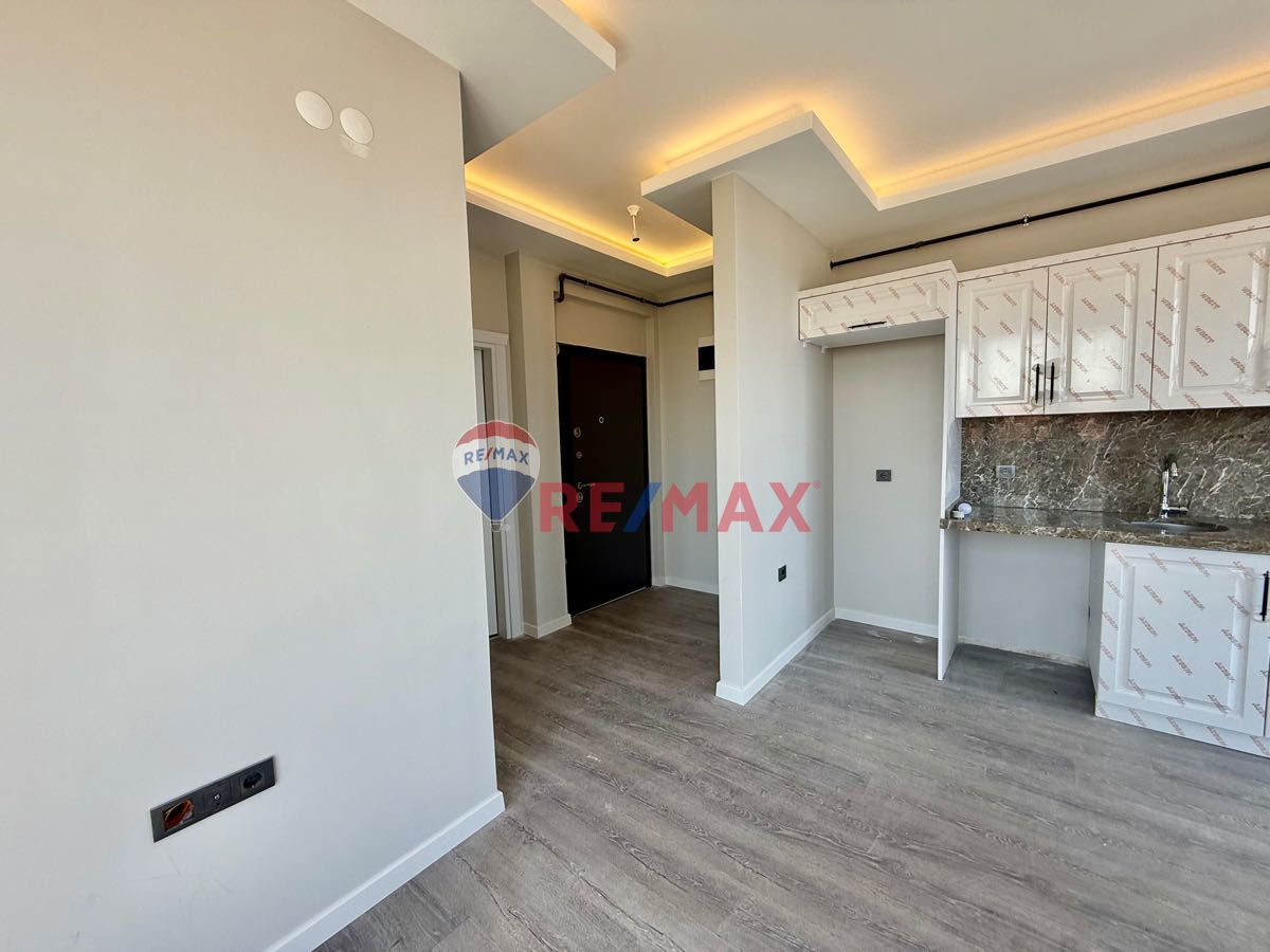 ASUMAN MÜTEVELLİOĞLUNDAN BÜYÜKOYUMCA DA KİRALIK 1 + 1 MANZARALI DAİRE