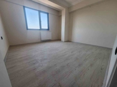 SIFIR 2+1 ARA KAT AÇIK MUTFAKLI MERKEZİ KONUMDA