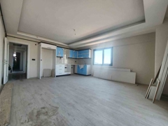 SIFIR 2+1 ARA KAT AÇIK MUTFAKLI MERKEZİ KONUMDA