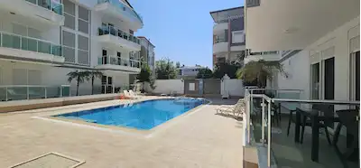 SİDE'DE SİTE İÇERİSİNDE SATILIK HAVUZLU EŞYALI 2+1 DUBLEKS DAİRE
