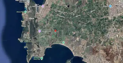 SEFERİHİSAR SIĞACIK' DA DENİZE 750 MT MESAFEDE YATIRIMA UYGUN 4157 M² TARLA
