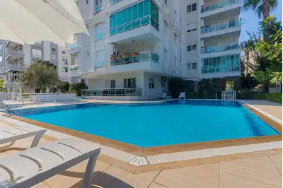 KONYAALTI UNCALI’DA 3+1 SATILIK HAVUZLU, KAPALI OTOPARKLI ARA KAT DAİRE