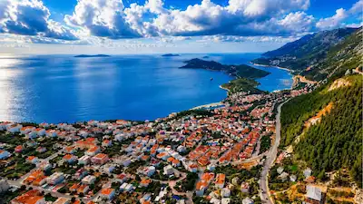 KAŞ’IN EN İYİ MANZARASINA SAHİP 8.033 M² ÖNÜ KAPANMAZ ARAZİ  