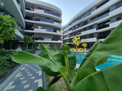 KUŞADASI'NDA GÜVENLİKLİ YENİ PROJEDE SIFIR 2+1 HAVUZLU+D.GAZLI