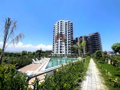 REMAX TOROS'TAN ÇEŞMELİ'DE DENİZ MANZARALI SATILIK 2+1