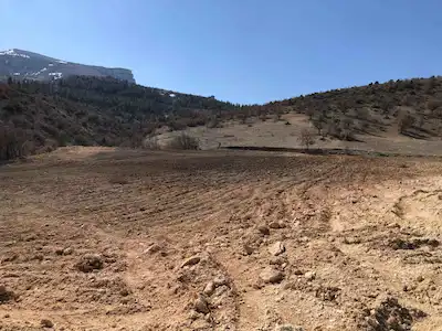 AKÇADAĞ KADIİBRAHİM MAHALLESİ'NDE 11.113M² SATILIK TARLA