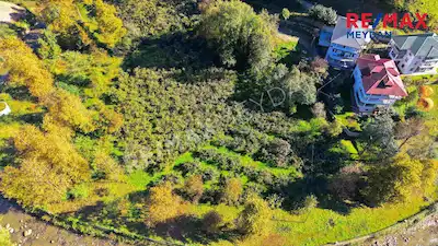 AKÇAABAT DERECİK KARAMAN MAHALLESİ’NDE SATILIK 1664 M² VİLLALIK ARSA