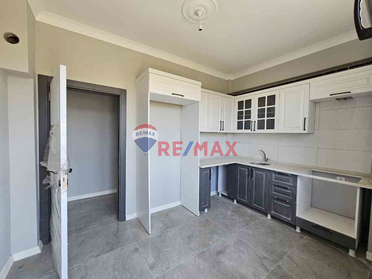 REMAX ŞEHİR 2 'DEN ÇİFTLİKKÖY SİTELER MAH.'DE SATILIK 2+1 DAİRE