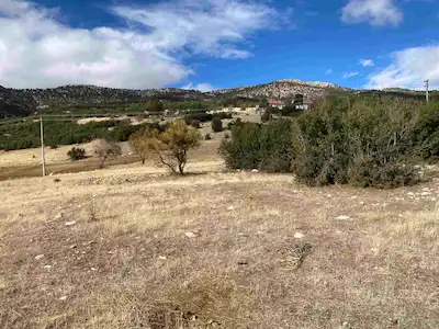 ANTALYA KORKUTELİ KEVZER’DE MÜSTAKİL PARSEL SATILIK 18619M2 TARLA