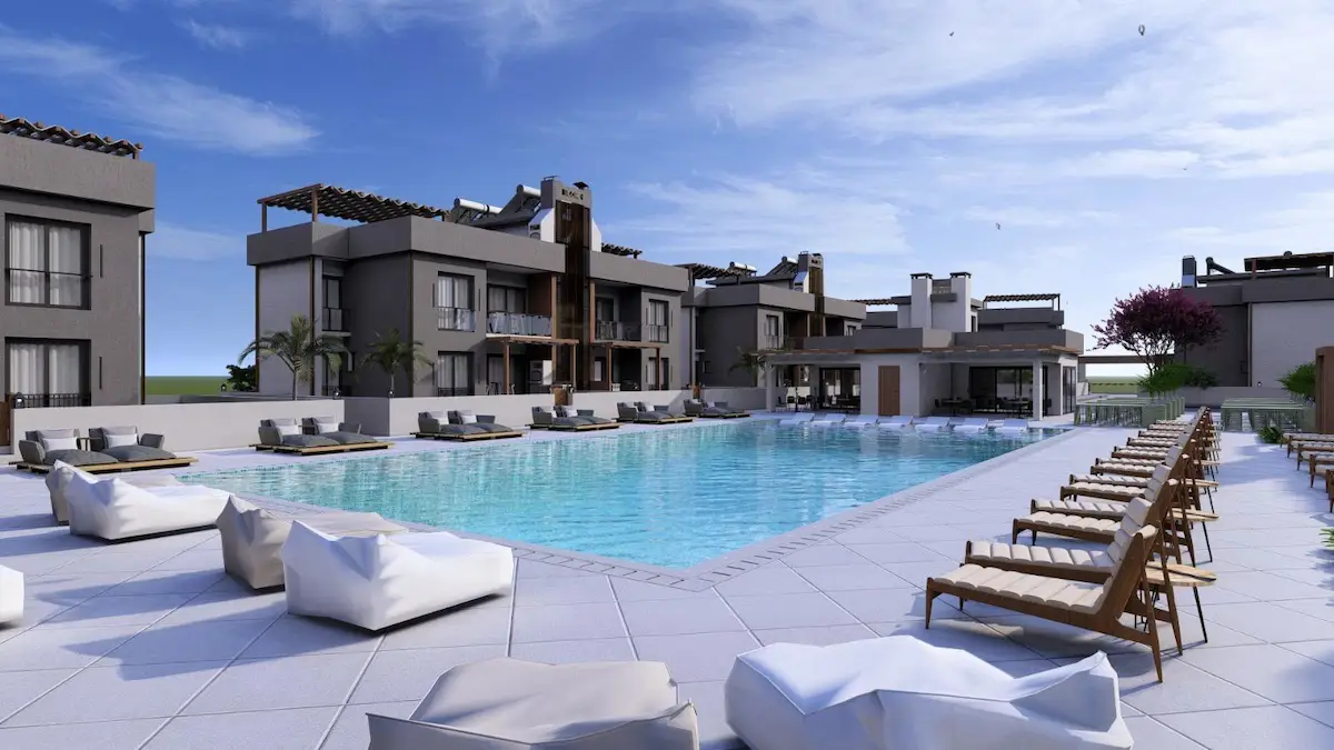 GİRNE LAPTA'DA PLAJA YÜRÜYÜŞ MESAFESİNDE 2+1 DAİRE
