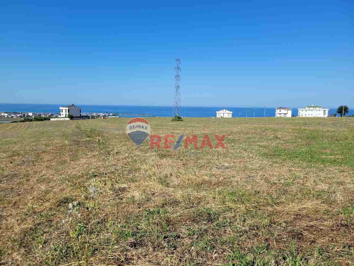 REMAXSEVCAN GÜRLEVİKTEN TAŞKELİKTE DENİZ MANZARALI SATILIK VİLLA ARSASI