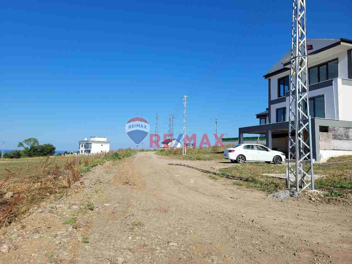 REMAXSEVCAN GÜRLEVİKTEN TAŞKELİKTE DENİZ MANZARALI SATILIK VİLLA ARSASI