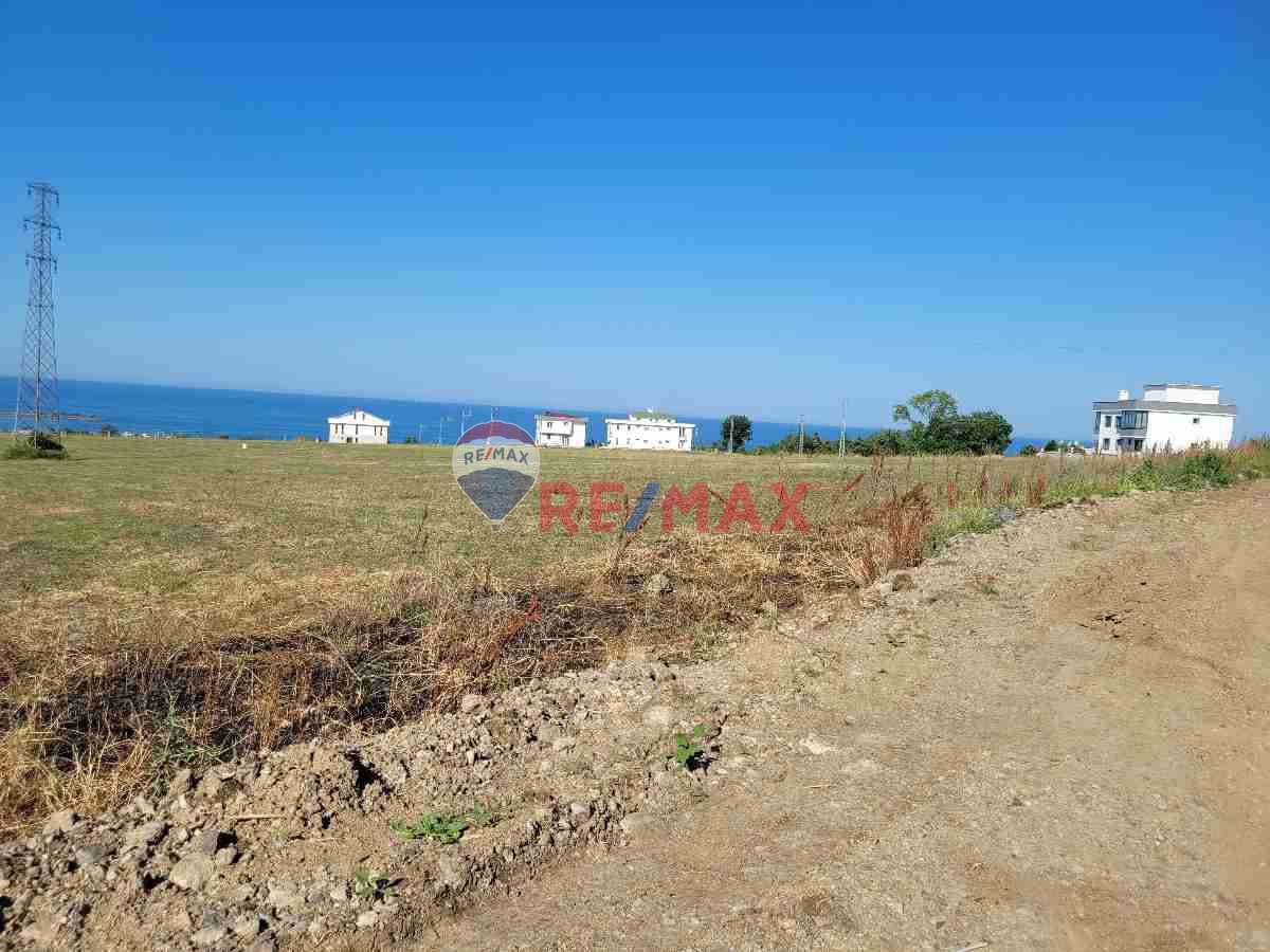 REMAXSEVCAN GÜRLEVİKTEN TAŞKELİKTE DENİZ MANZARALI SATILIK VİLLA ARSASI