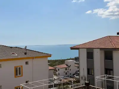 AYDIN DIDIM AKBÜK’TE DENIZ MANZARALI SITE IÇERISINDE BAHÇELI 1 + 1 DAIRE