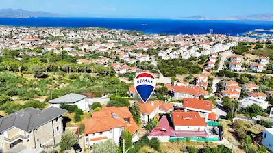 DATÇA MERKEZ'DE PANORAMİK DENIZ MANZARALI 2+1 SATILIK DAIRE