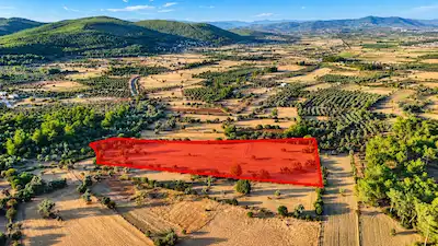 MUĞLA BODRUM PINARLIBELEN’DE YATIRIM DEĞERI YÜKSEK 25.435M² SATILIK TARLA
