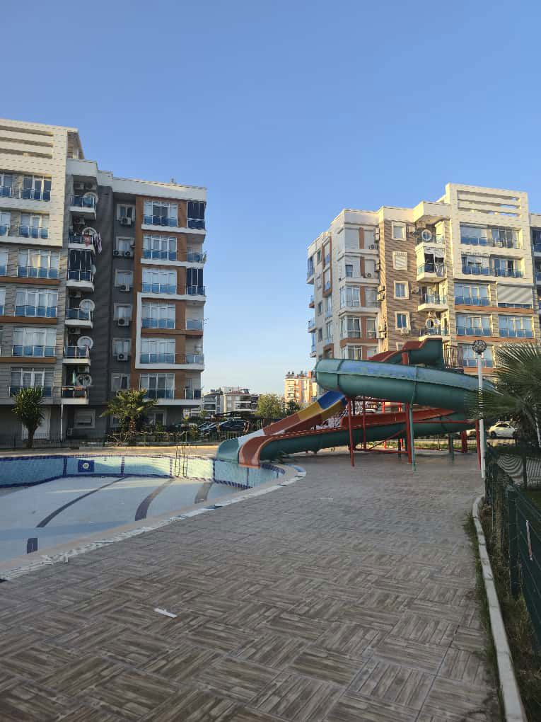 KEPEZ GÖKSU'DA HAVUZLU SİTE İÇERİSİNDE EŞYALI BAHÇE KATI KİRALIK DAİRE