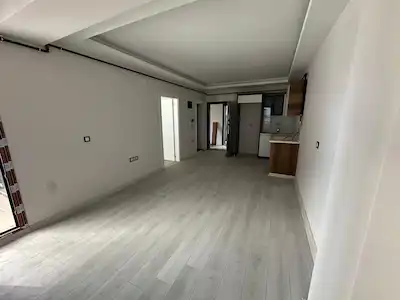 209 SEYREK İNÖNÜ MAHALLESİ'NDE SIFIR 1+1 ARA KAT SATILIK DAİRE