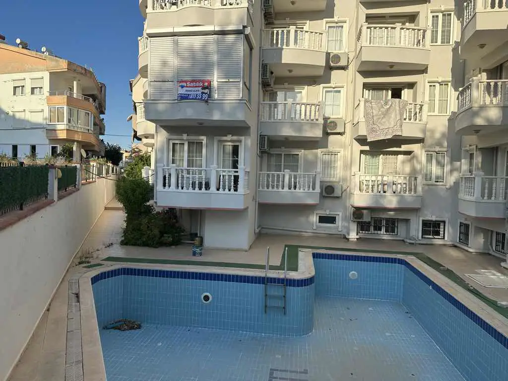 DİDİM DE HAVUZLU SİTEDE LİMAN YOLUNA CEPHE 1+1 DAİRE