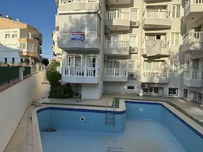DİDİM DE HAVUZLU SİTEDE LİMAN YOLUNA CEPHE 1+1 DAİRE
