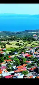 ÇANAKKALE , AYVACIK KOZLU KÖYÜNDE DENIZ MANZARASI OLAN SATILIK BAHÇE