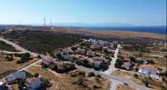ÇEŞME GERMIYAN'DA DENIZ MANZARALI VE PROJELI VILLA İMARLI ARSA