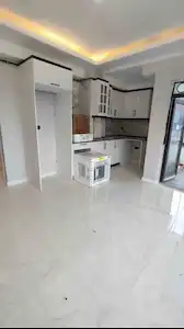 ATAKUM’DA DENİZ MANZARALI CAM BALKONLU ARA KAT 1+1 KREDİYE UYGUN