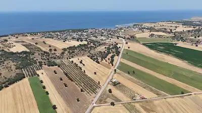 ÇANAKKALE EZINE YENIKÖY’DE SATILIK 815 M² TARLA HISSESI