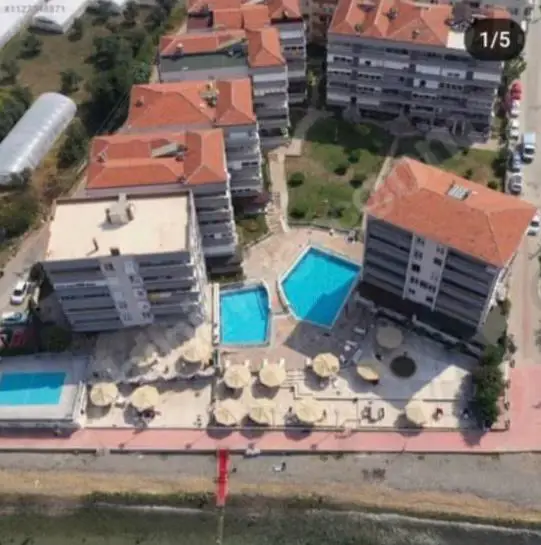 ÇINARCIK’TA SİTE İÇİNDE EŞYALI 2+1 | ÇİFT CEPHELİ, BALKONLU, KREDİYE UYGUN