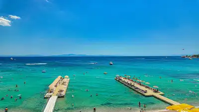 DIDIM ALTINKUM’DA SATILIK DENIZ MANZARALI DENIZE SIFIR 4+2 EŞYALI DUBLEKS DAIRE