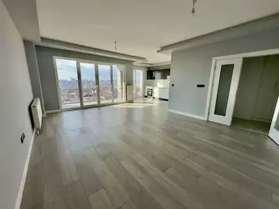 BAĞCILAR’DA 10. KAT 3+1 | 130 M² BRÜT | 2 BANYO 3 WC | BALKONLU, MERKEZİ ISITMA
