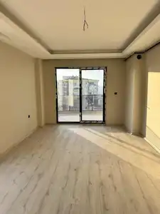 ATAKUM NİŞANTAŞI CADDESİNDE DENİZ MANZARALI SATILIK 2+1 DAİRE