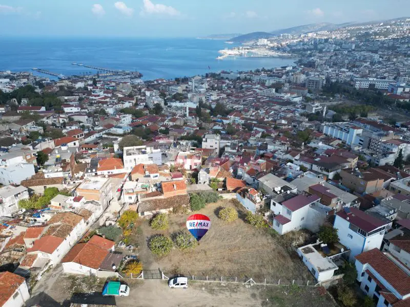 KUŞADASI CAMIATIK DE 2 KAT KONUT İMARLI SATILIK 1369 M2 ARSA 