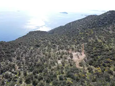 KAŞ SARIBELEN'DE DENIZ MANZARALI, 10.580M² YATIRIMLIK ARAZI