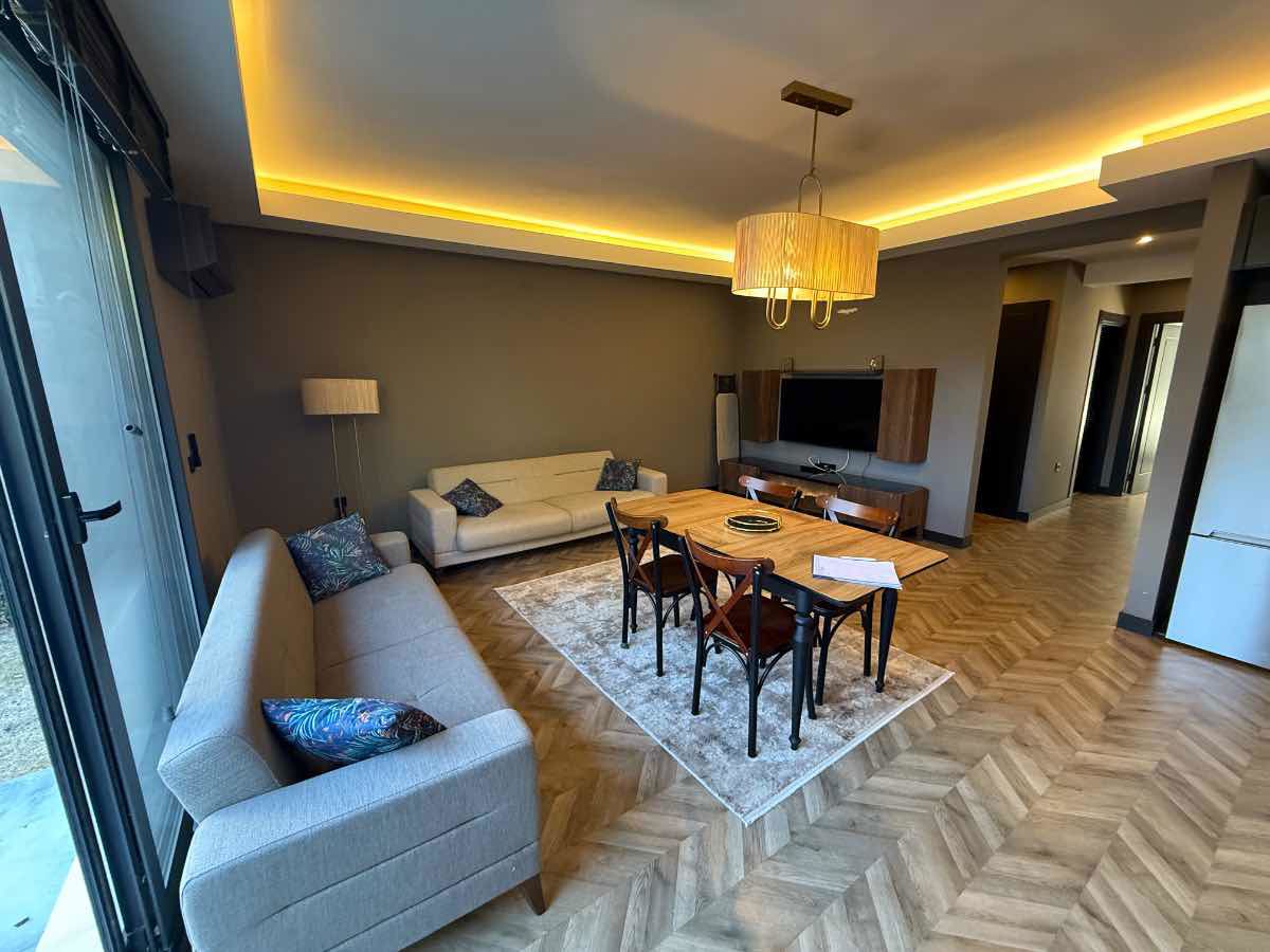 URLA GÜVENDIKTE EŞYALI BAHÇE KATI 2+1 KIRALIK REZIDANS DAIRESI