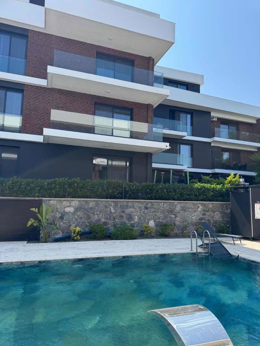 URLA GÜVENDIKTE EŞYALI BAHÇE KATI 2+1 KIRALIK REZIDANS DAIRESI